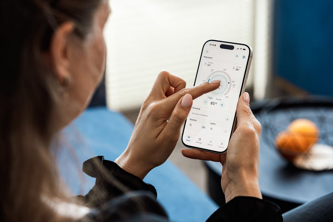 Person controlling home temperature from a smartphone app