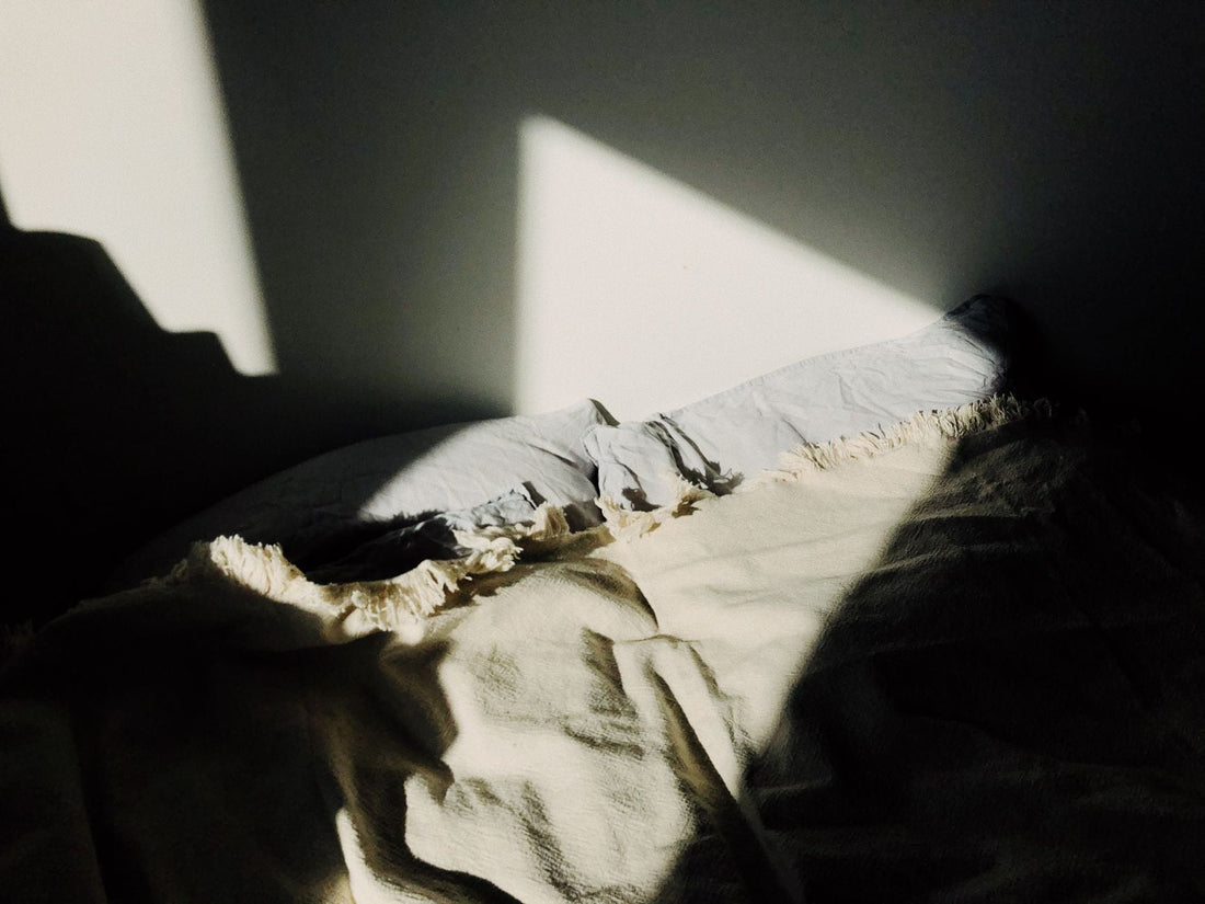 Afternoon sunlight streaming into a bedroom, illustrating how sun exposure makes some rooms warmer than others