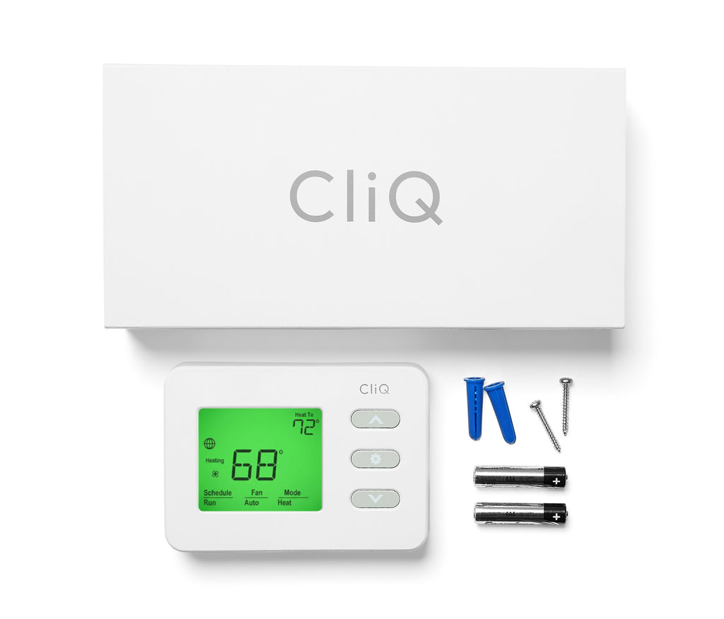 CliQ thermostat with batteries and screws on a white background